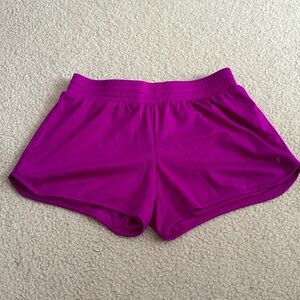 Danskin Now Dri-More purple shorts.
